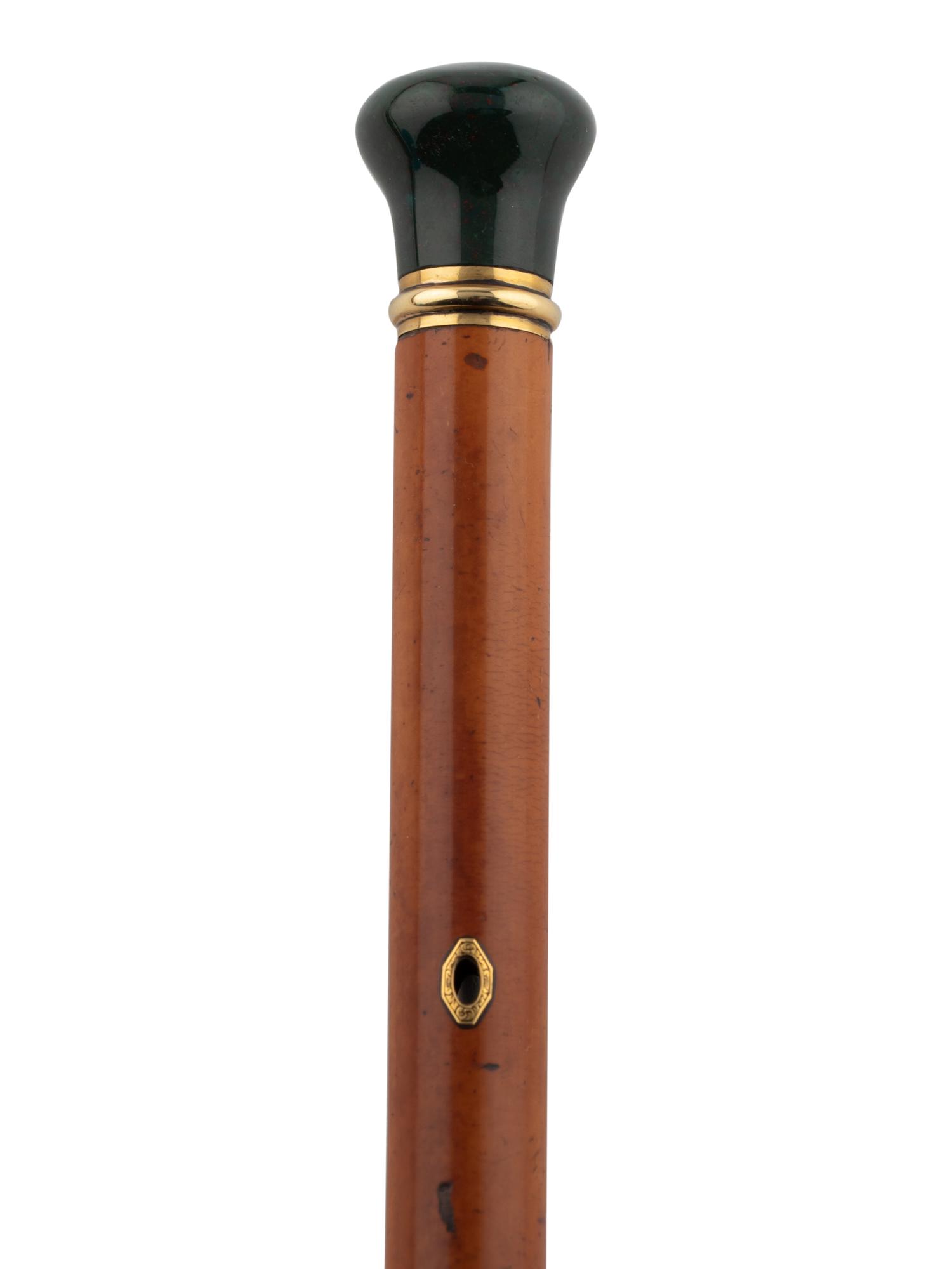 Two Gold Mounted Walking Sticks