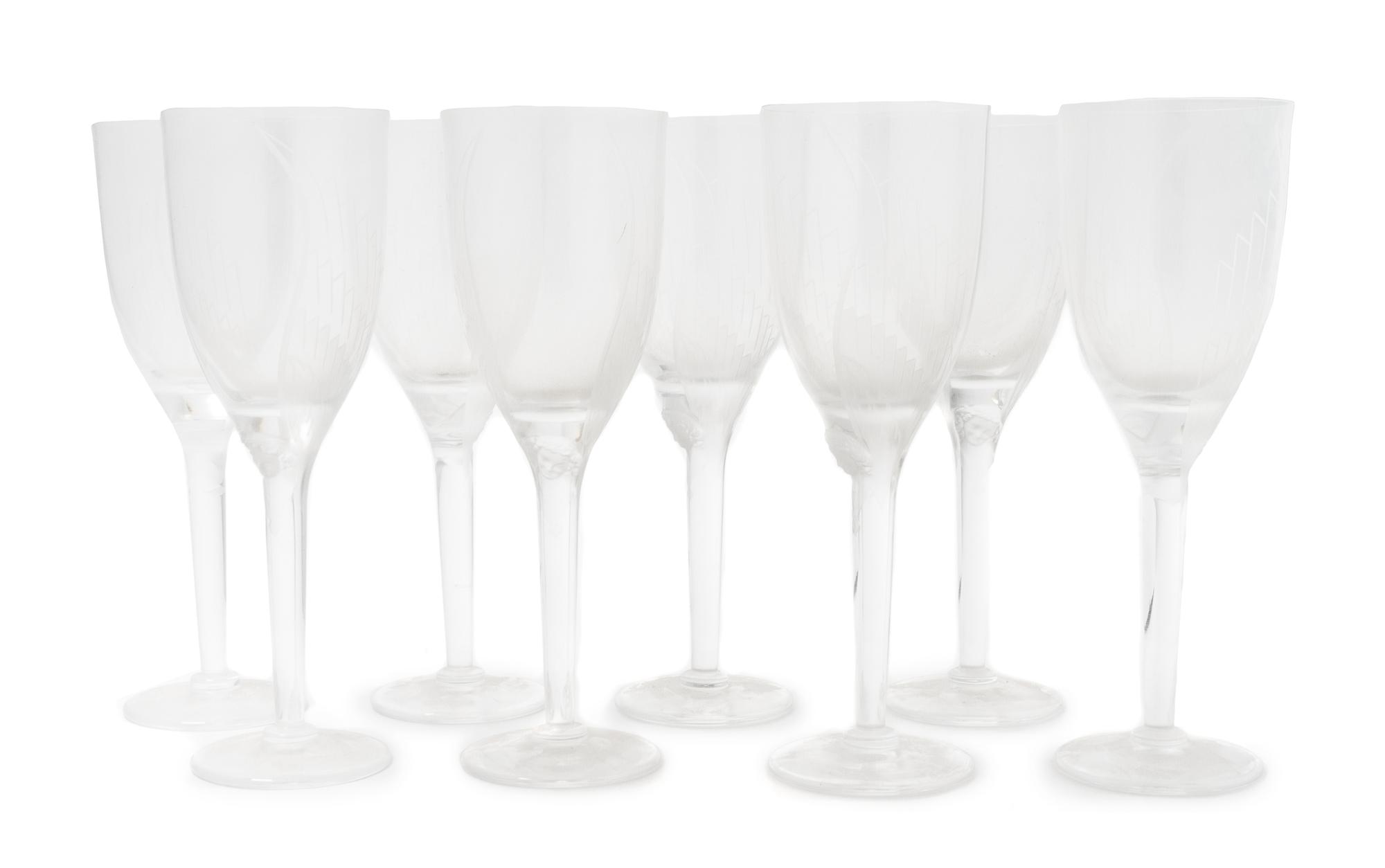 A Set of Eight Lalique Glass Wine Glasses Height 8 inches.