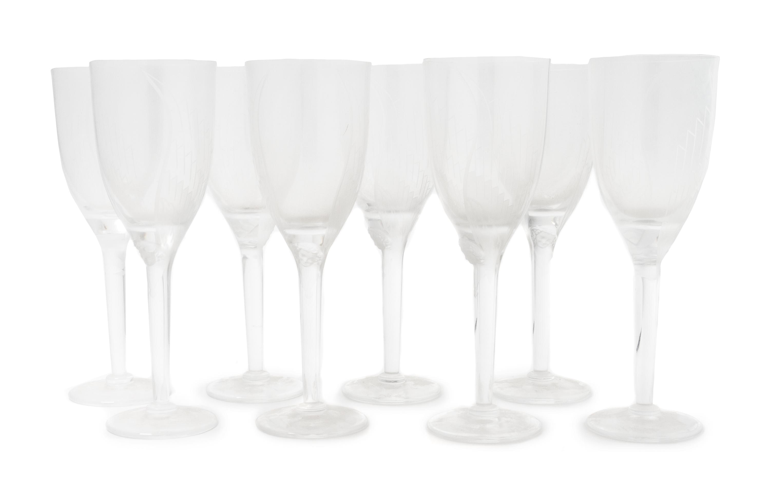 A Set of Eight Lalique Glass Wine Glasses Height 8 inches.
