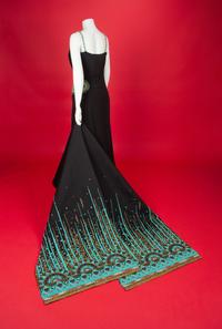 Christian Dior Haute Couture Dress and Shawl, 2008 — In 2008, Renée Fleming was the first woman to open the season of New York’s Metropolitan Opera. For the occasion, she wore four haute couture creations, including this dress by John Galliano for Christian Dior for her role as The Countess in Strauss’s Capriccio. Annie Lebovitz photographed Fleming in all four dresses for a 2008 Vogue article called ‘La Dolce Vida’ by Hamish Bowles. In the article, Galliano is quote as saying that Fleming’s voice, with its ‘whole timbre of colors, emotions, and tones, made me want to create something bold, vivacious, sensual, and capricious.’