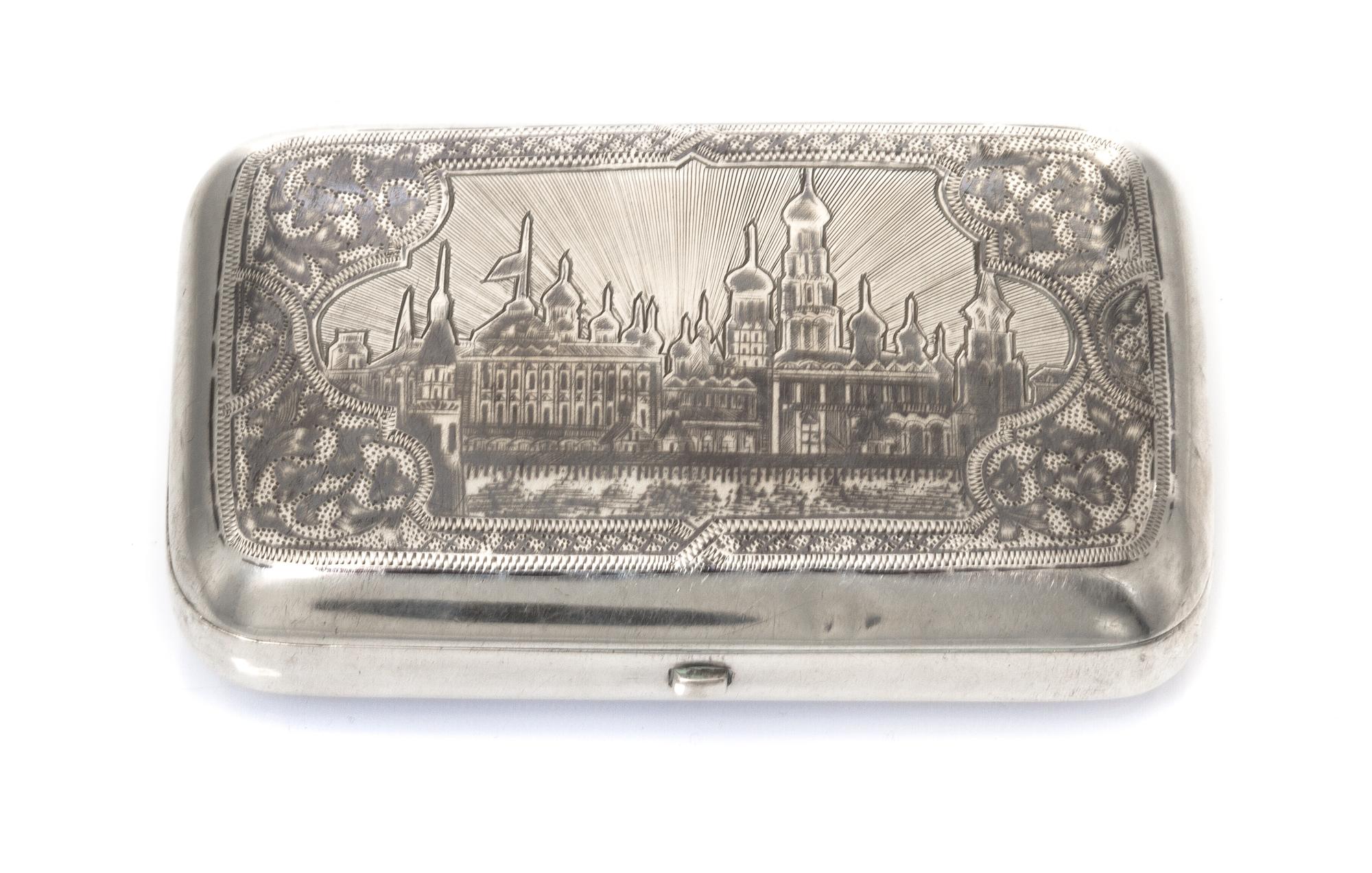A Russian Niello Silver Cigarette Case, Maker's mark Cyrillic IA, assay mark of Vasily Petrov, Moscow, 1884, the lid decorated with an