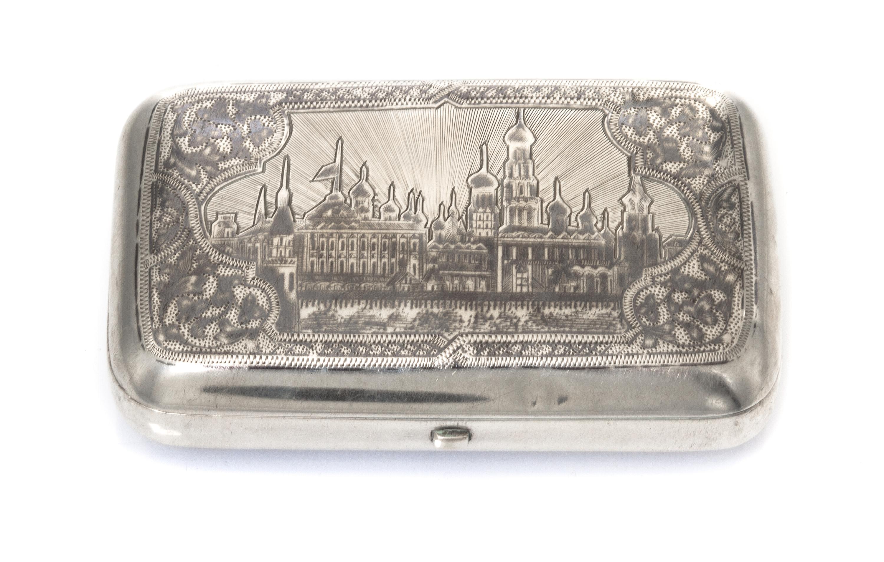 A Russian Niello Silver Cigarette Case, Maker's mark Cyrillic IA, assay mark of Vasily Petrov, Moscow, 1884, the lid decorated with an