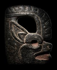 A Maya Stone Hacha in the Form of a Jaguar or Bat