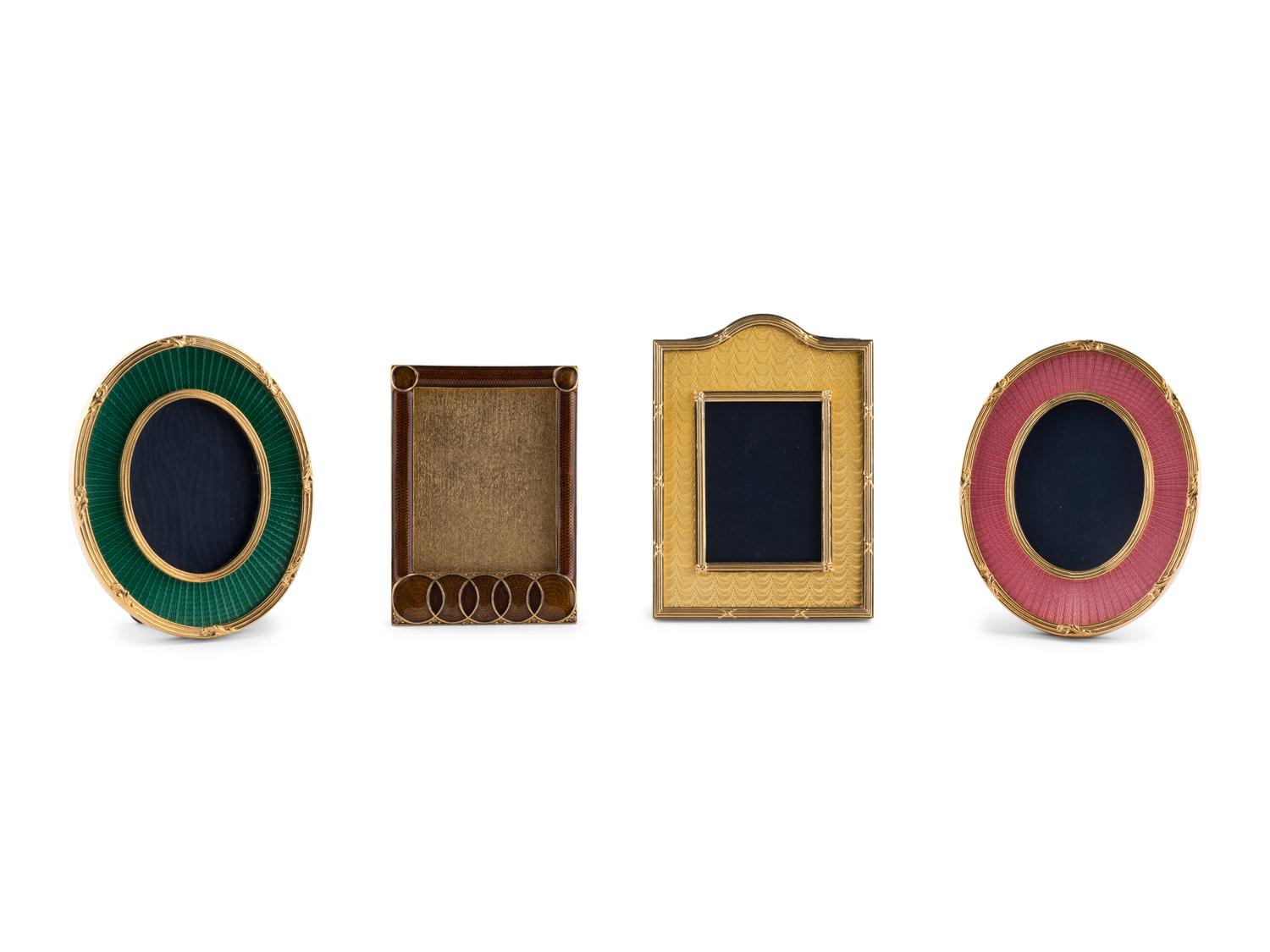 A Group of Four English Enamel and Gilt-Metal Picture Frames