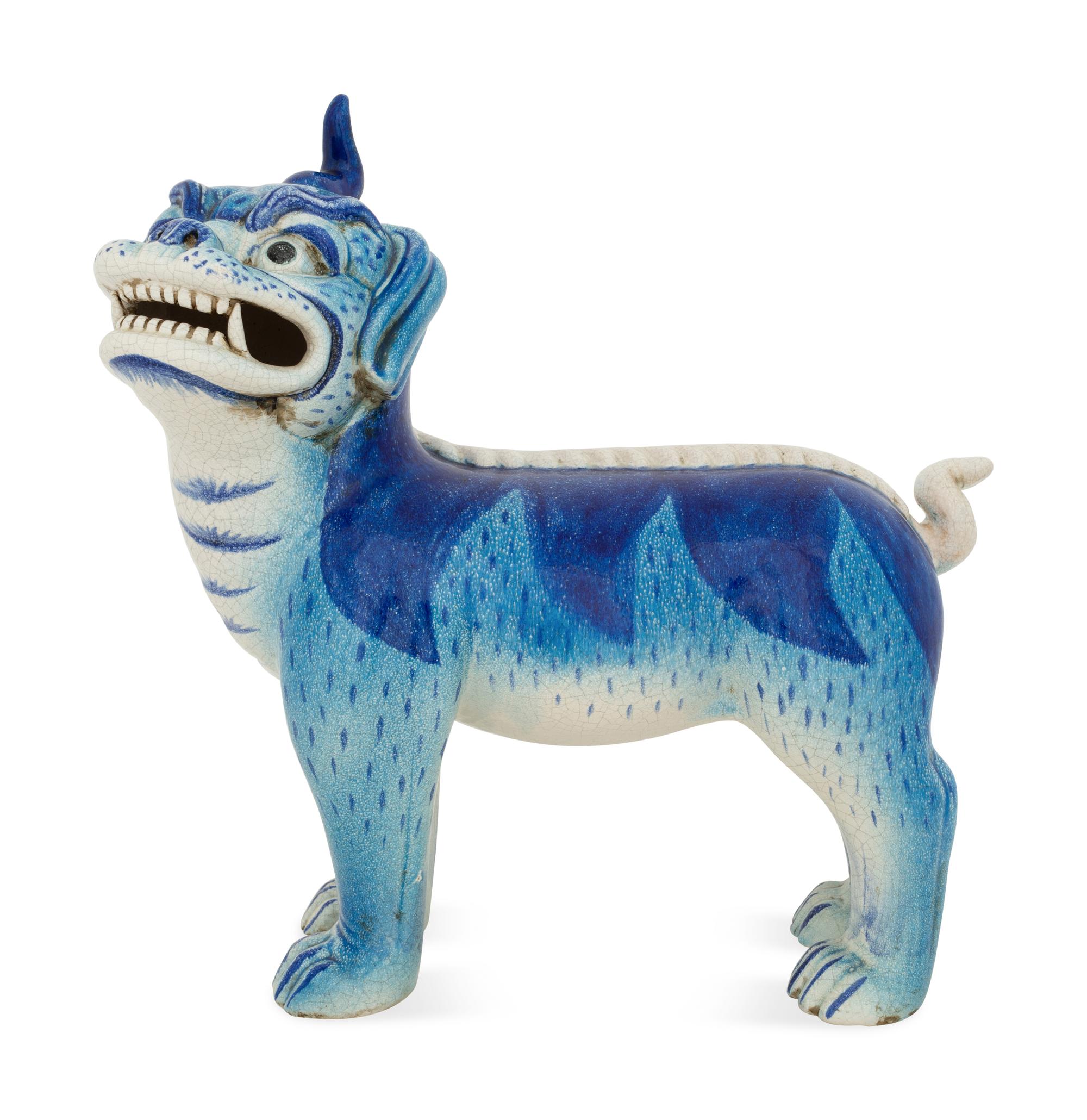 A Glazed Earthenware Guardian Lion