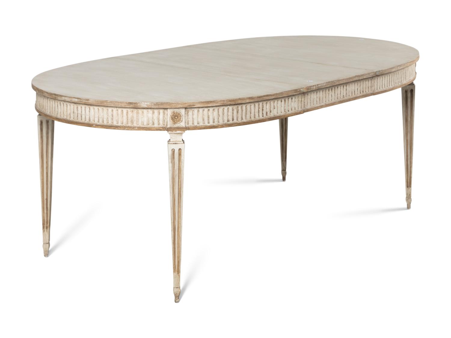 A Dennis and Leen Painted and Parcel-Gilt Dining Suite