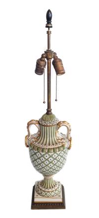 A Continental Porcelain Polychrome and Gilt Decorated Urn Height 27 inches.