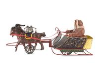 A Bliss Lithograph on Wood Santa on Sleigh and a Santa Claus on a Tin Sleigh