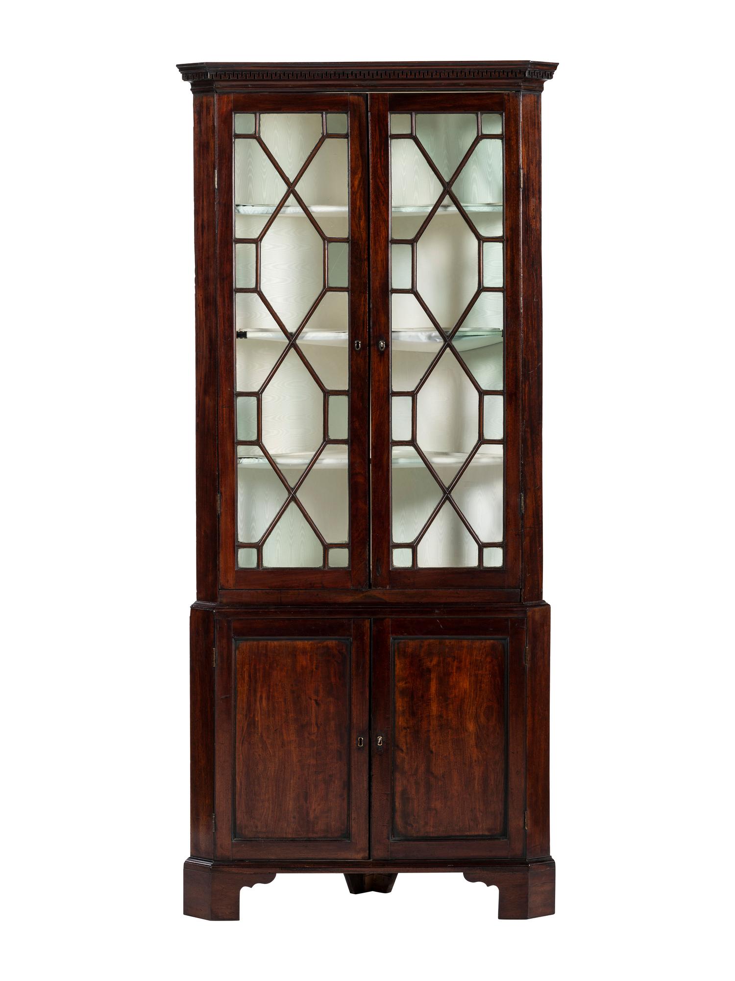 A George III Mahogany Corner Cupboard