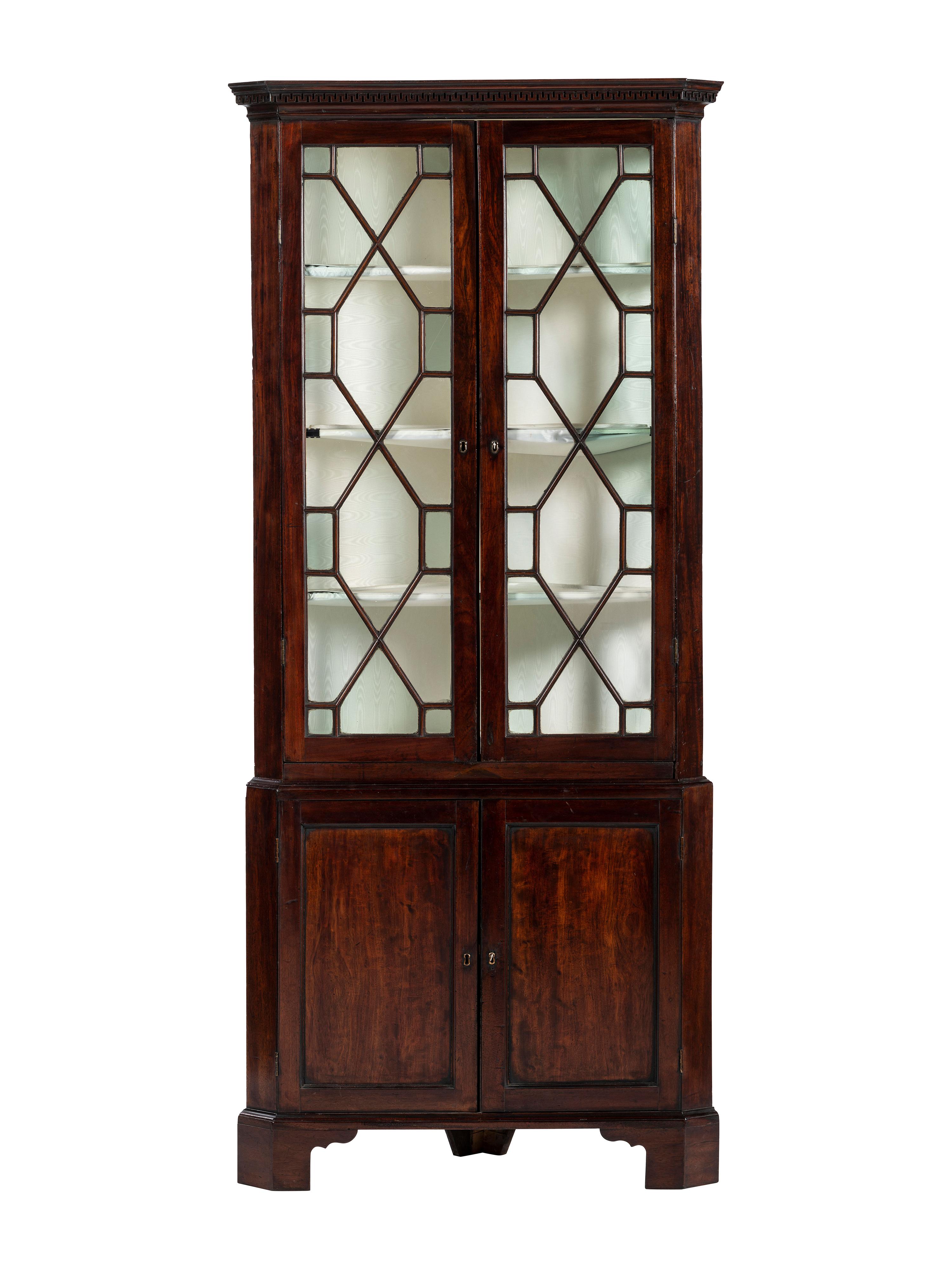A George III Mahogany Corner Cupboard