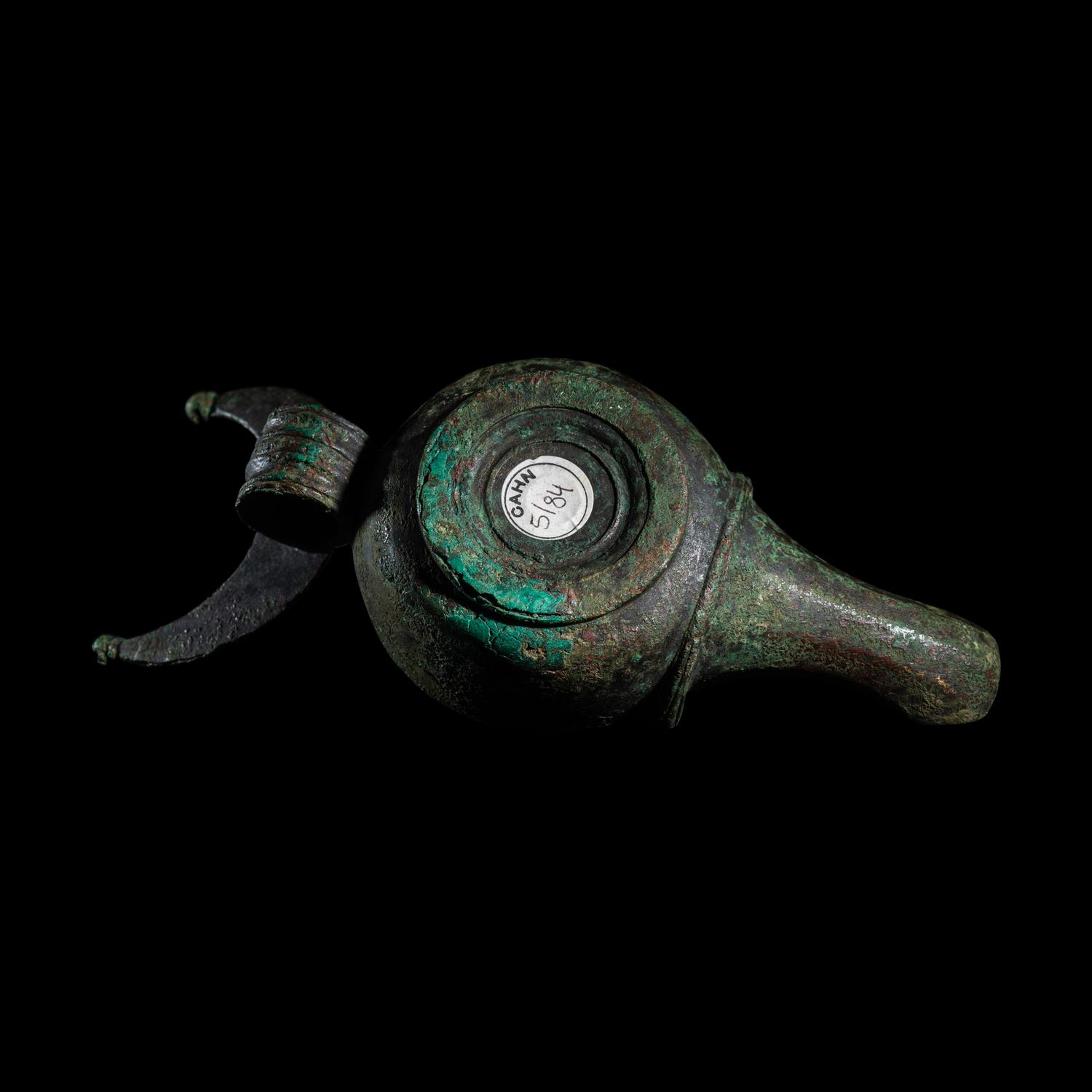 A Roman Bronze Oil Lamp