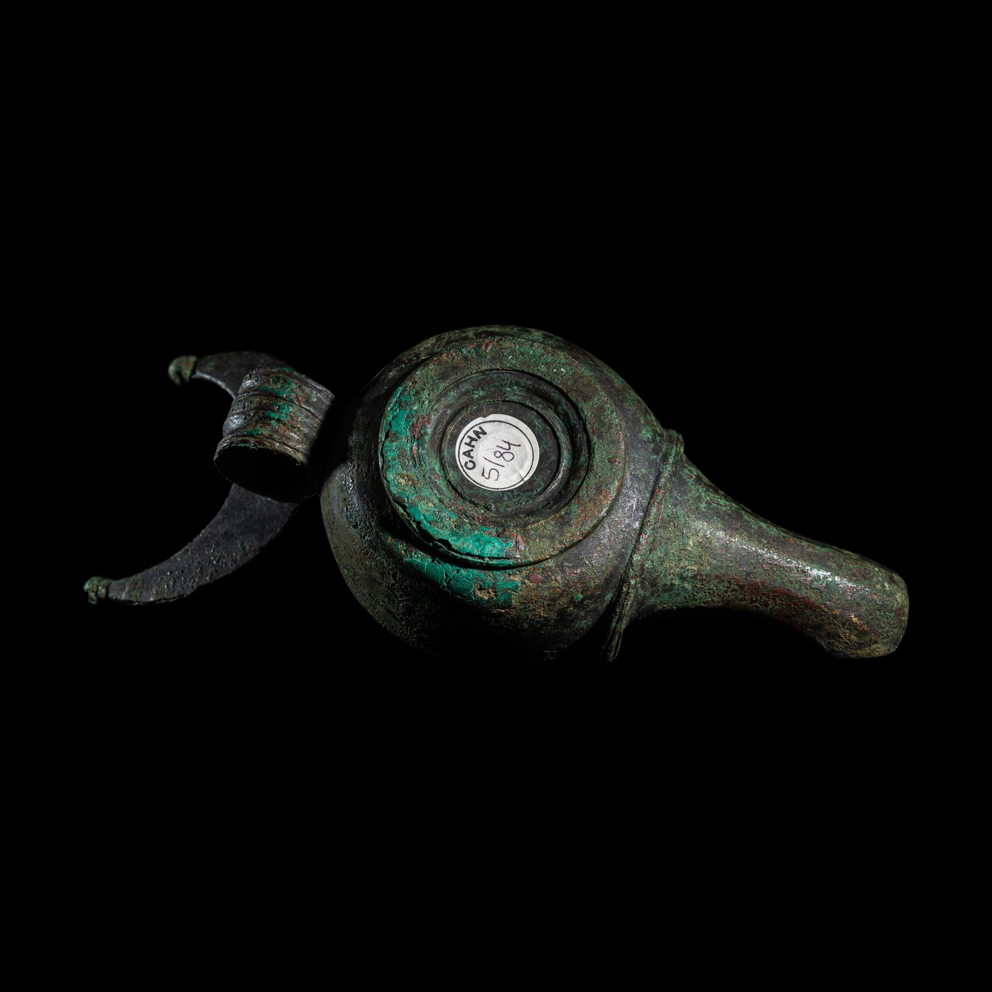 A Roman Bronze Oil Lamp