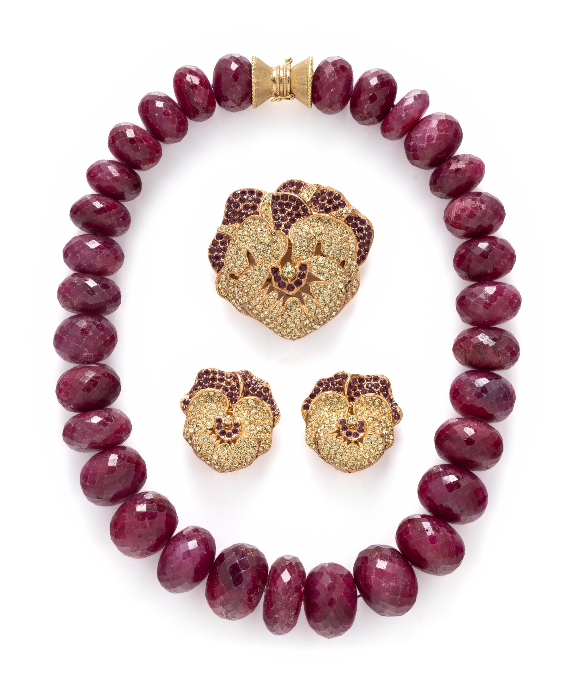 FACETED RUBY BEAD NECKLACE TOGETHER WITH A CINER PANSY DEMI PARURE