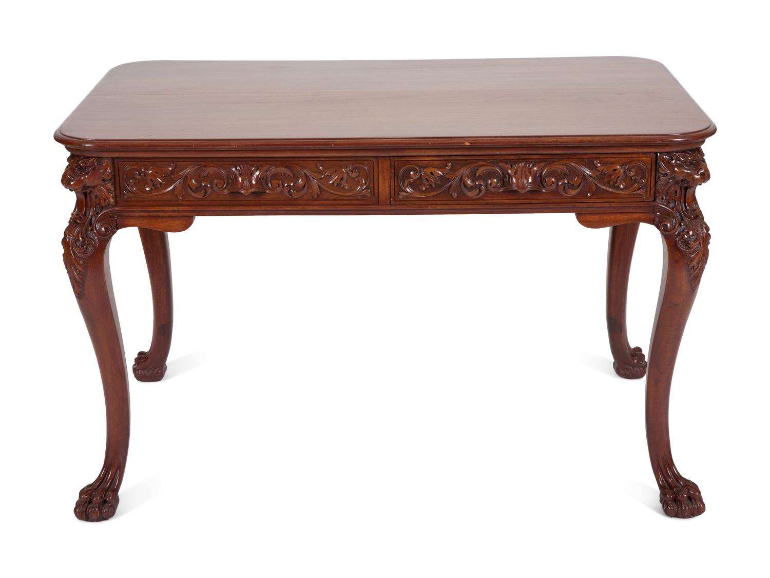 A Georgian Style Carved Mahogany Writing Table
