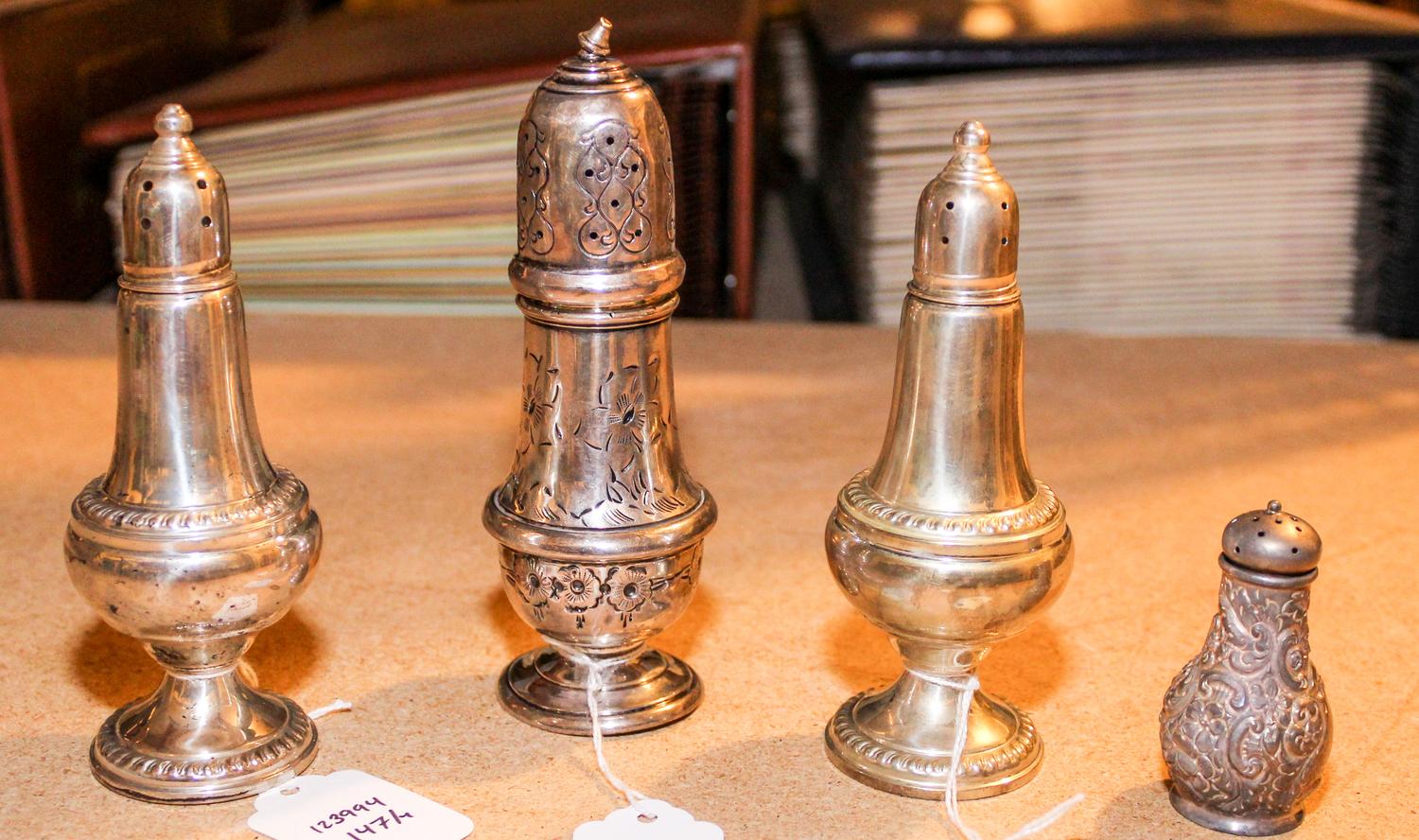 A Group of Four American Silver Casters, Various makers, each of baluster form, comprising a weighted pair and two others.