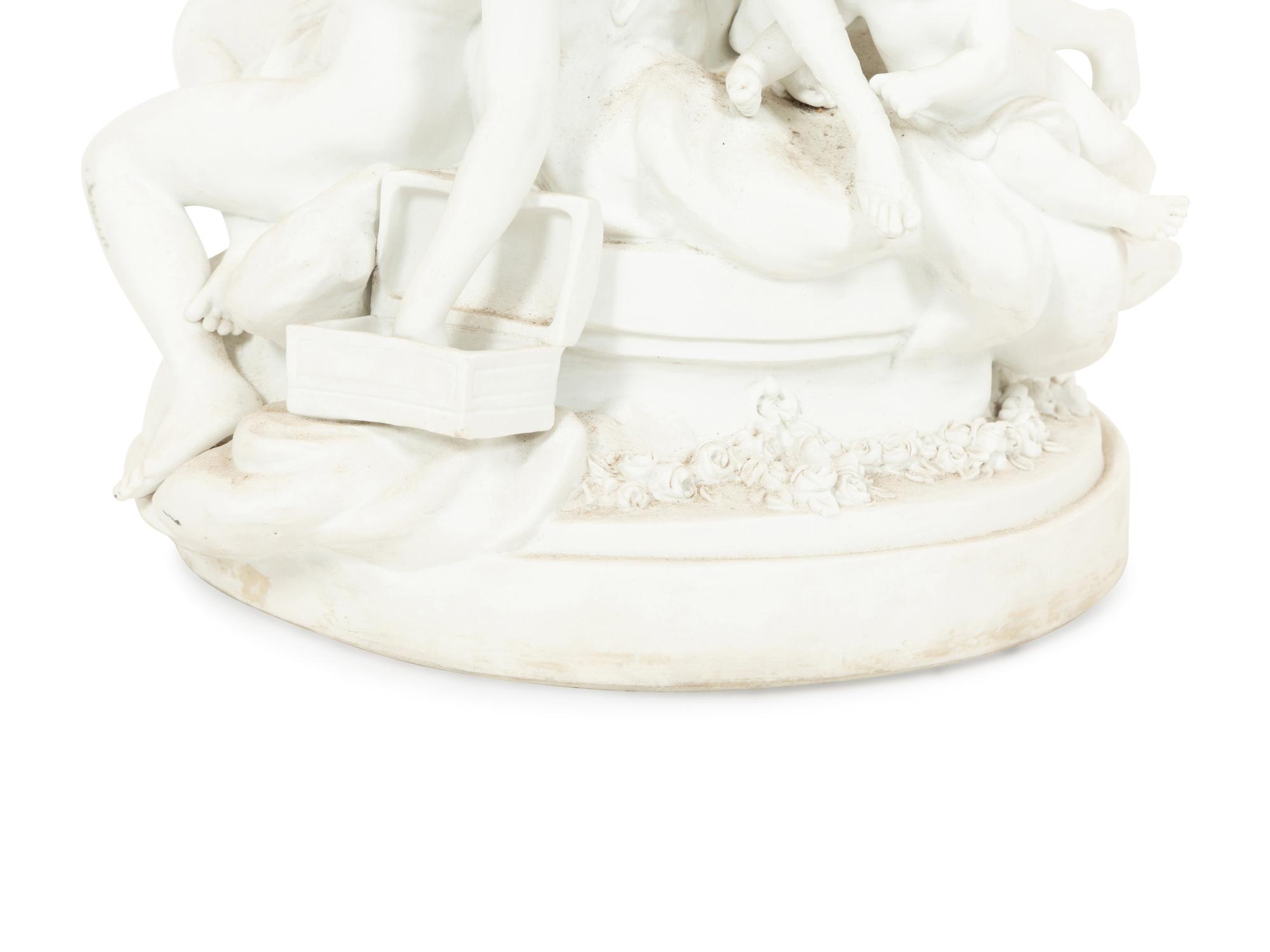 A Sèvres Bisque Porcelain Toilette de Venus Figural Group