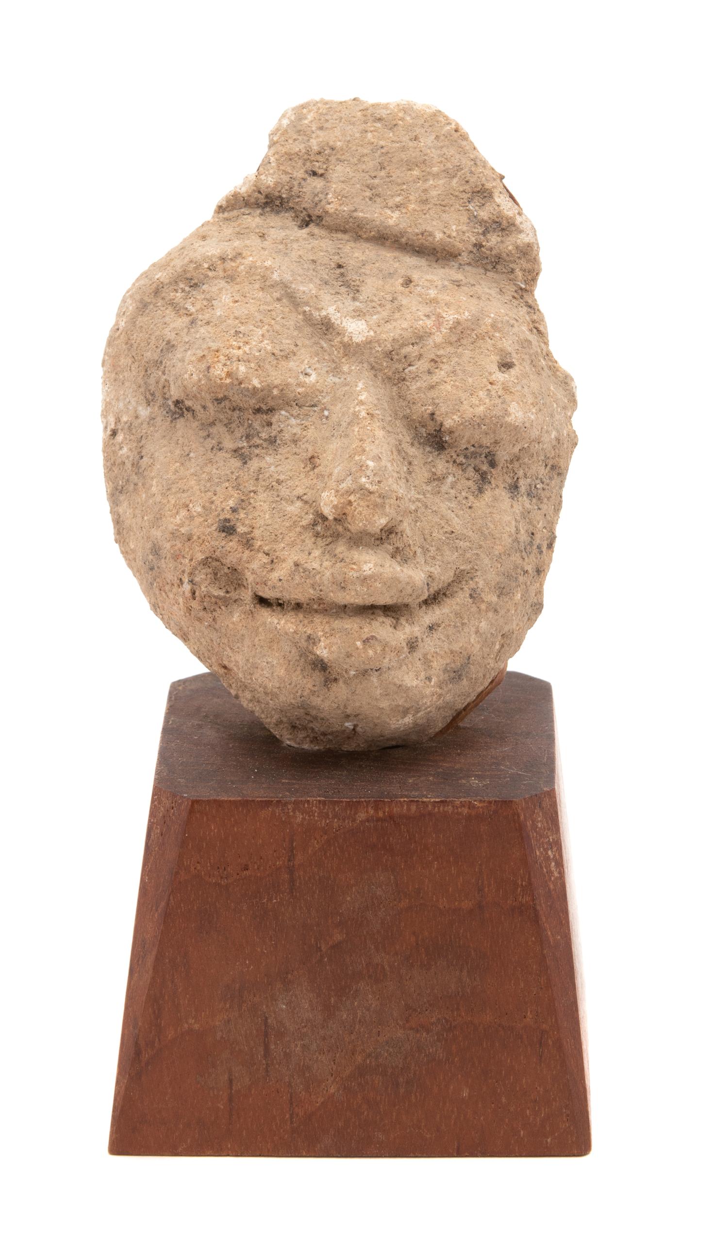 A Thai Stucco Face Fragment Height 4 inches. — MON-DVARAVATI STYLE, 8TH/9TH CENTURY