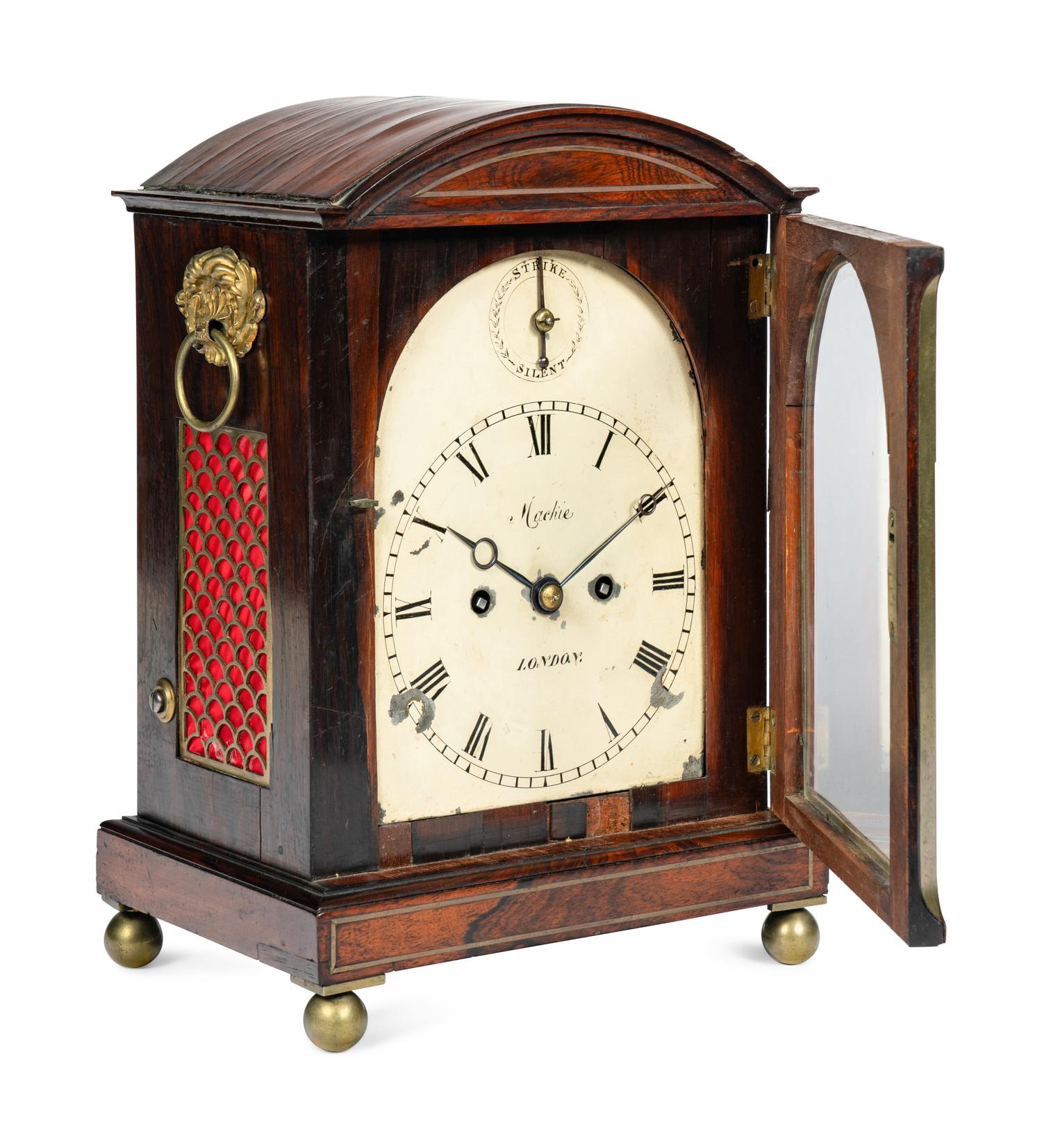 A Regency Rosewood and Brass-Inlaid Mantel Clock