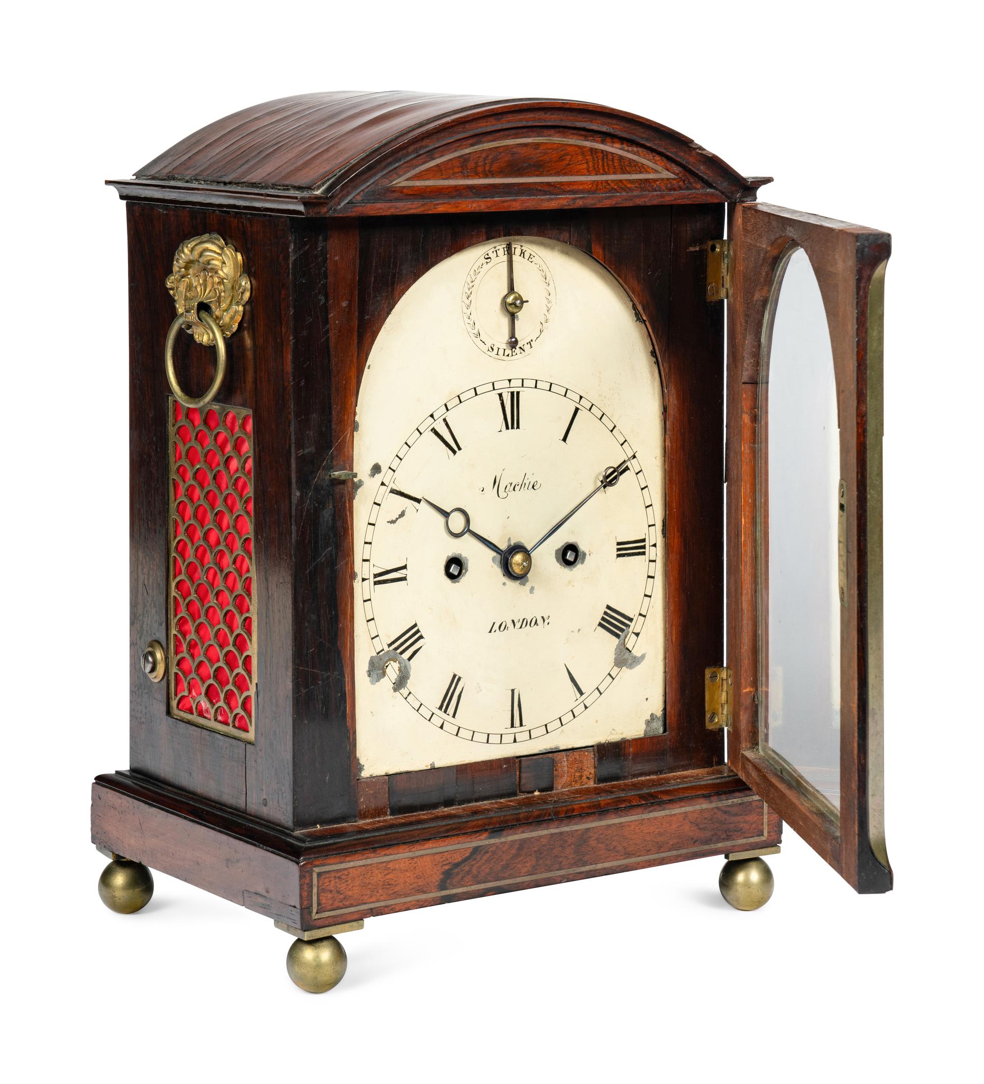 A Regency Rosewood and Brass-Inlaid Mantel Clock