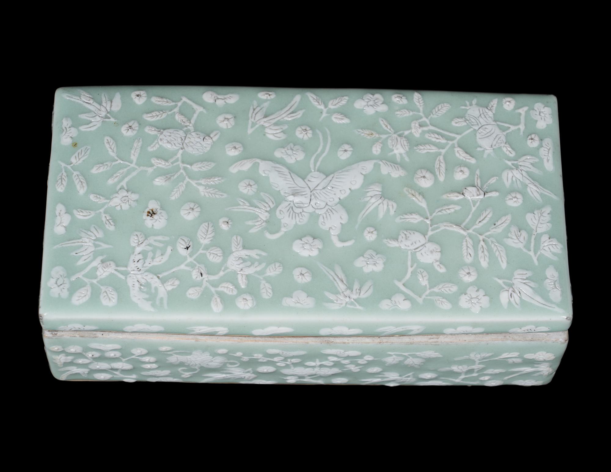 Two Chinese Carved Porcelain Covered Boxes