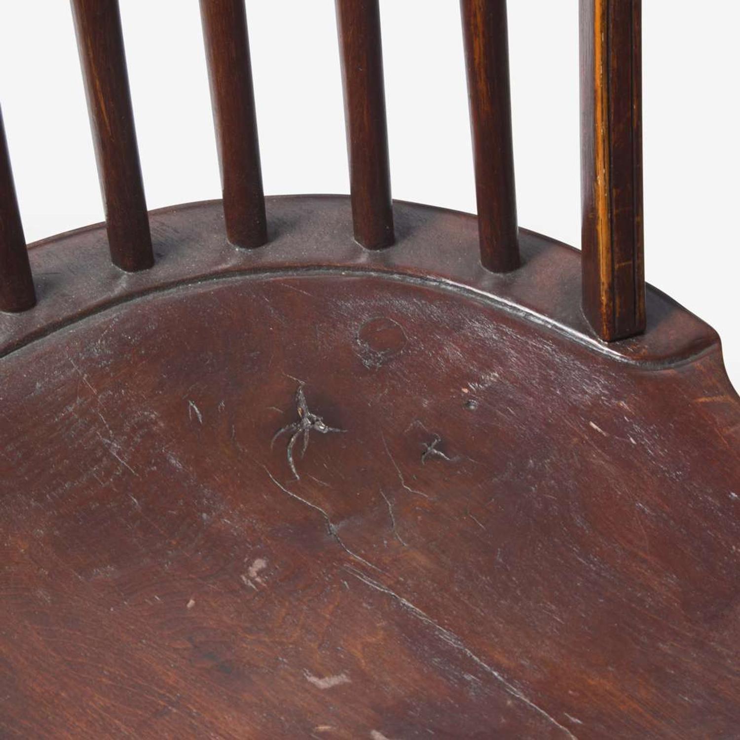 An assembled group of four bow-back Windsor chairs; circa 1800