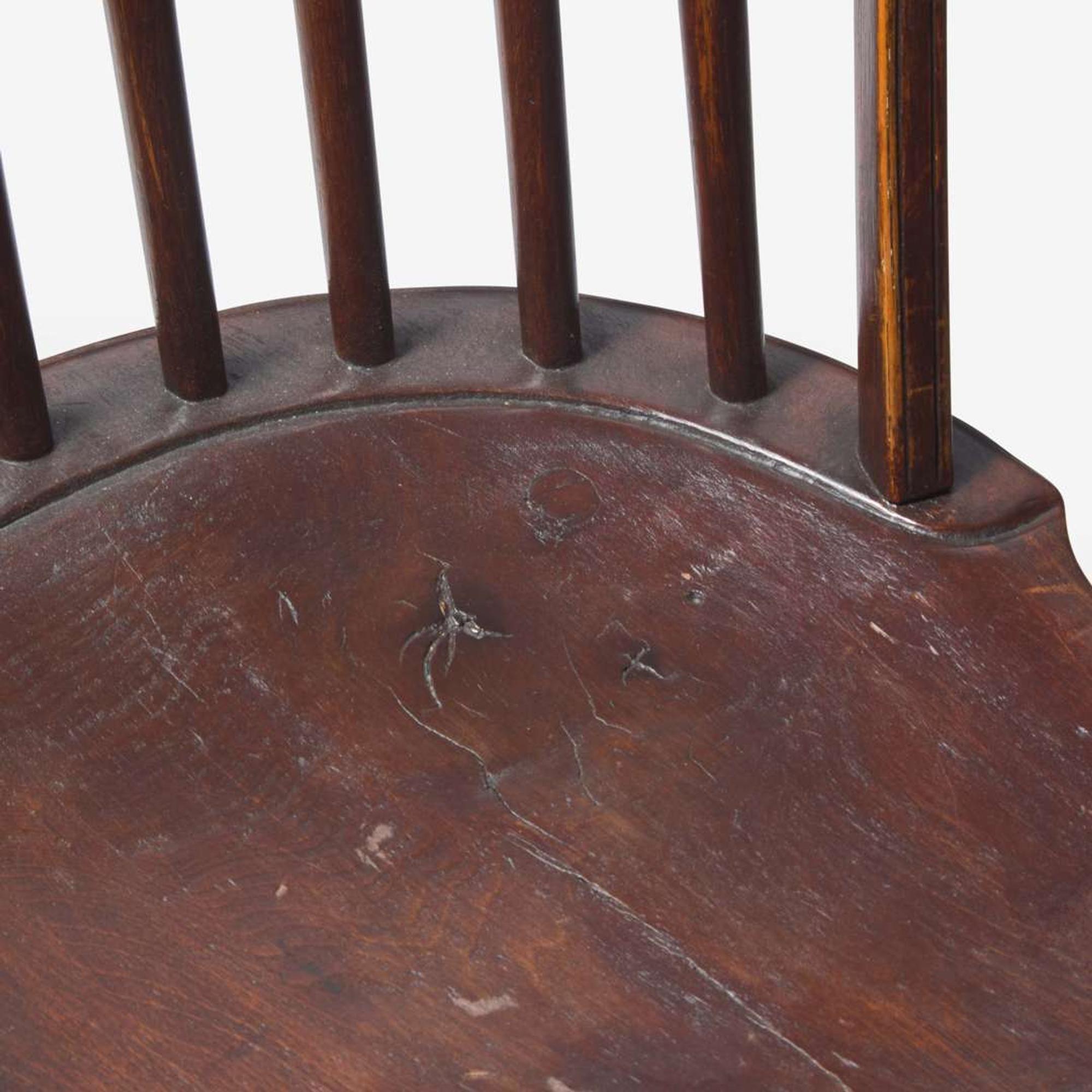 An assembled group of four bow-back Windsor chairs; circa 1800