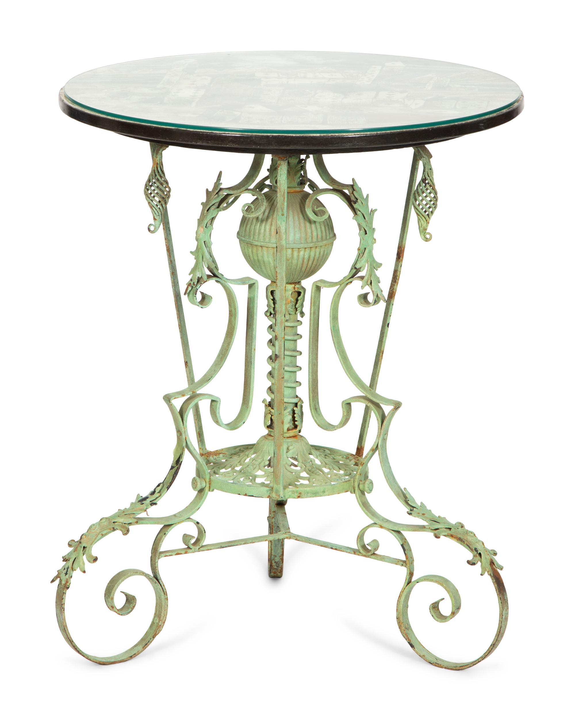 A Fornasetti Citta di Carte Table Top on Painted Wrought Iron Base