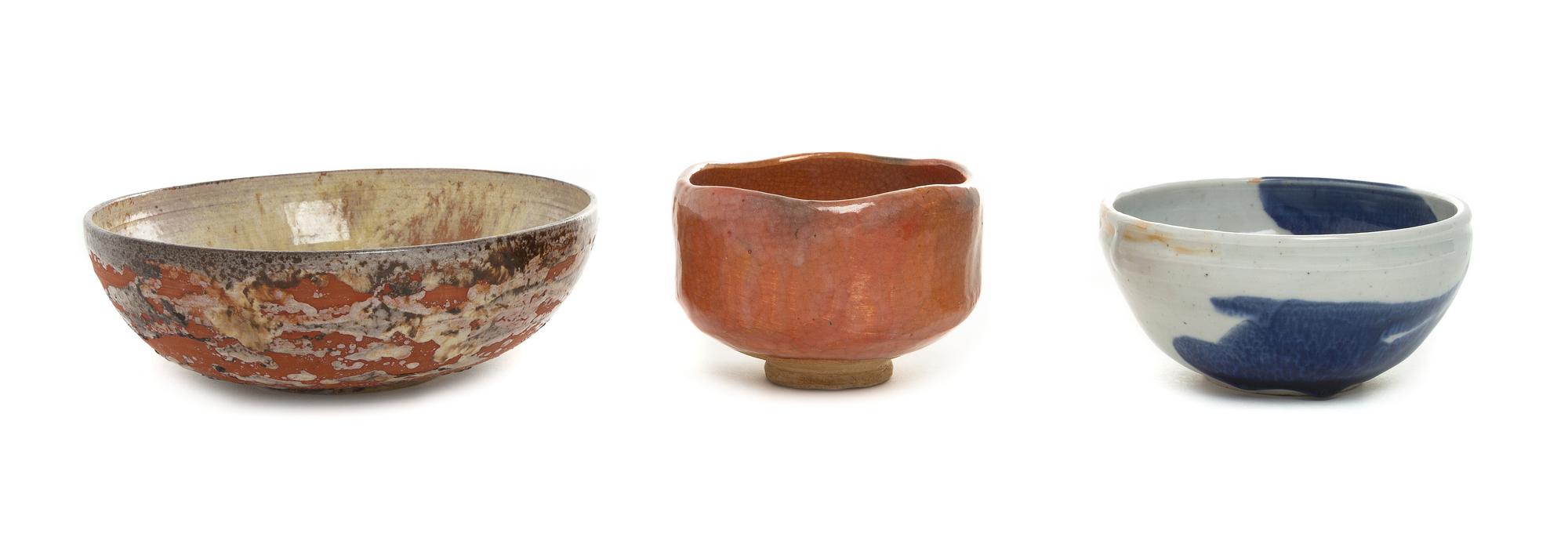 Three Japanese Pottery Bowls Height of largest 2 3/4 x diameter 7 1/2 inches.