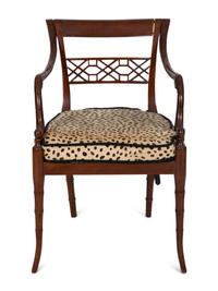 A Set of Four Regency Style Mahogany Cane Seat Dining Chairs
