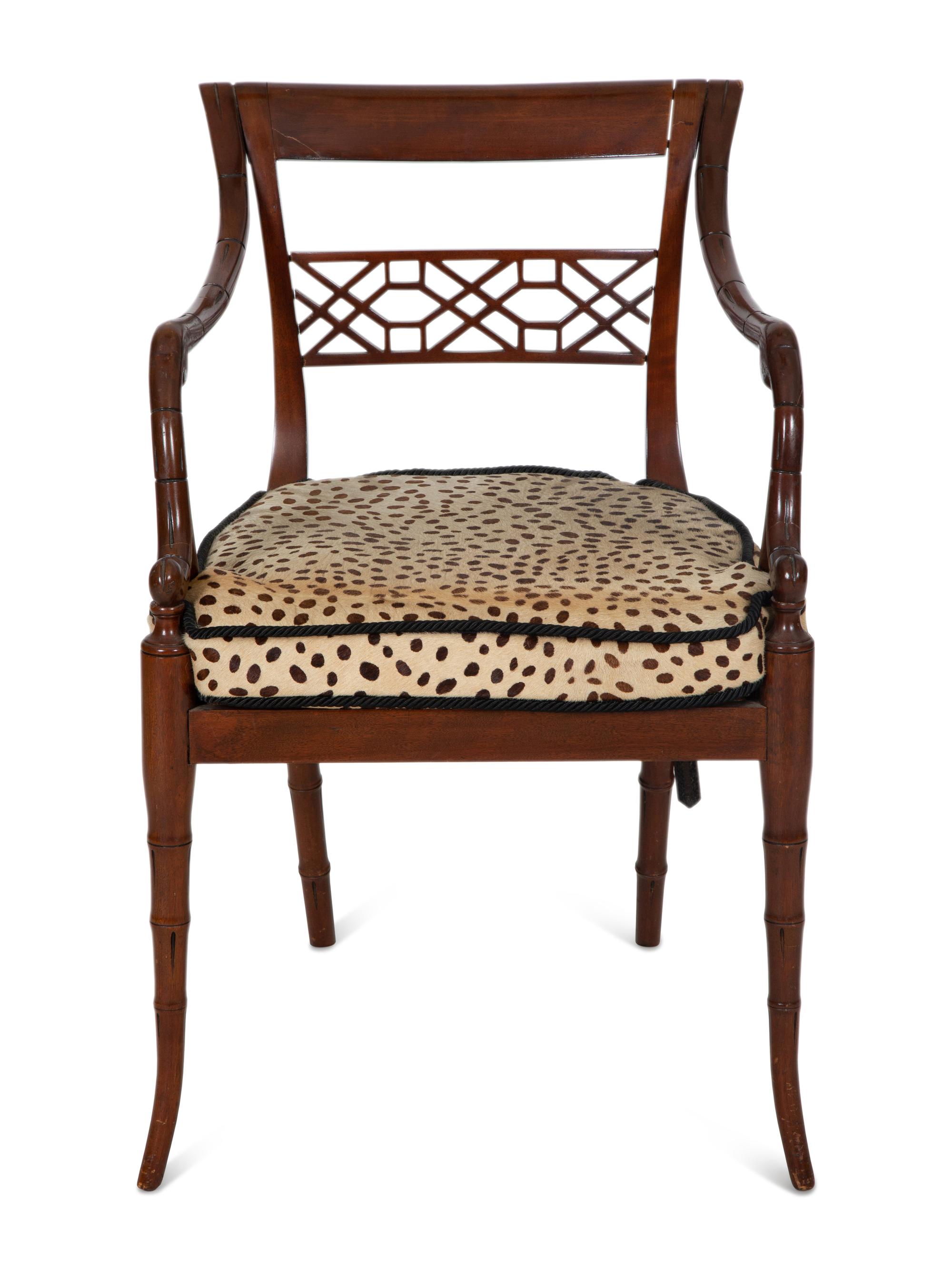 A Set of Four Regency Style Mahogany Cane Seat Dining Chairs