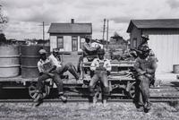 A Group of Four Reproduction Historical Photographs Largest 10 3/4 x 13 3/4 inches.