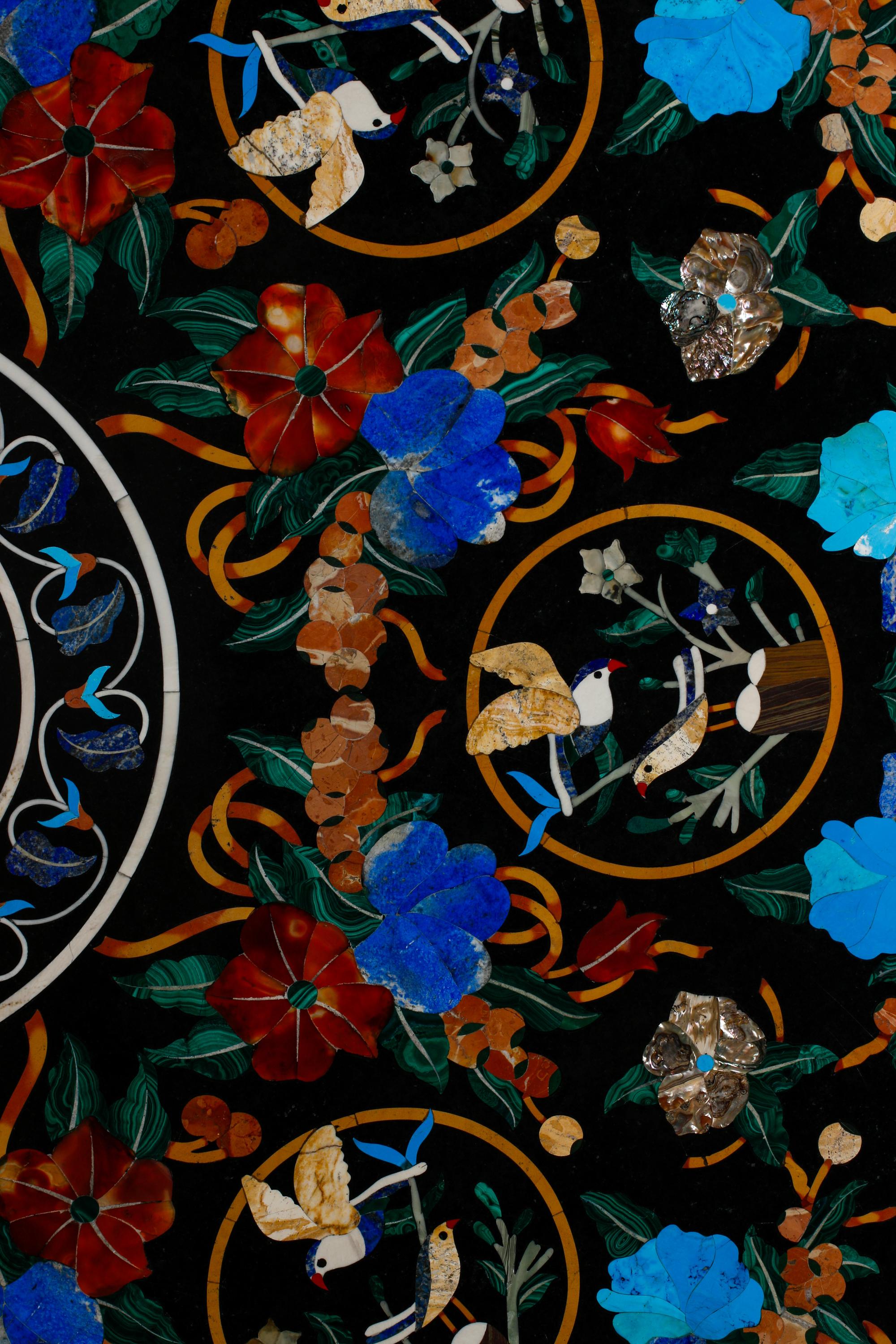 A Large Italian Pietra Dura Table Top on a Bronze Base