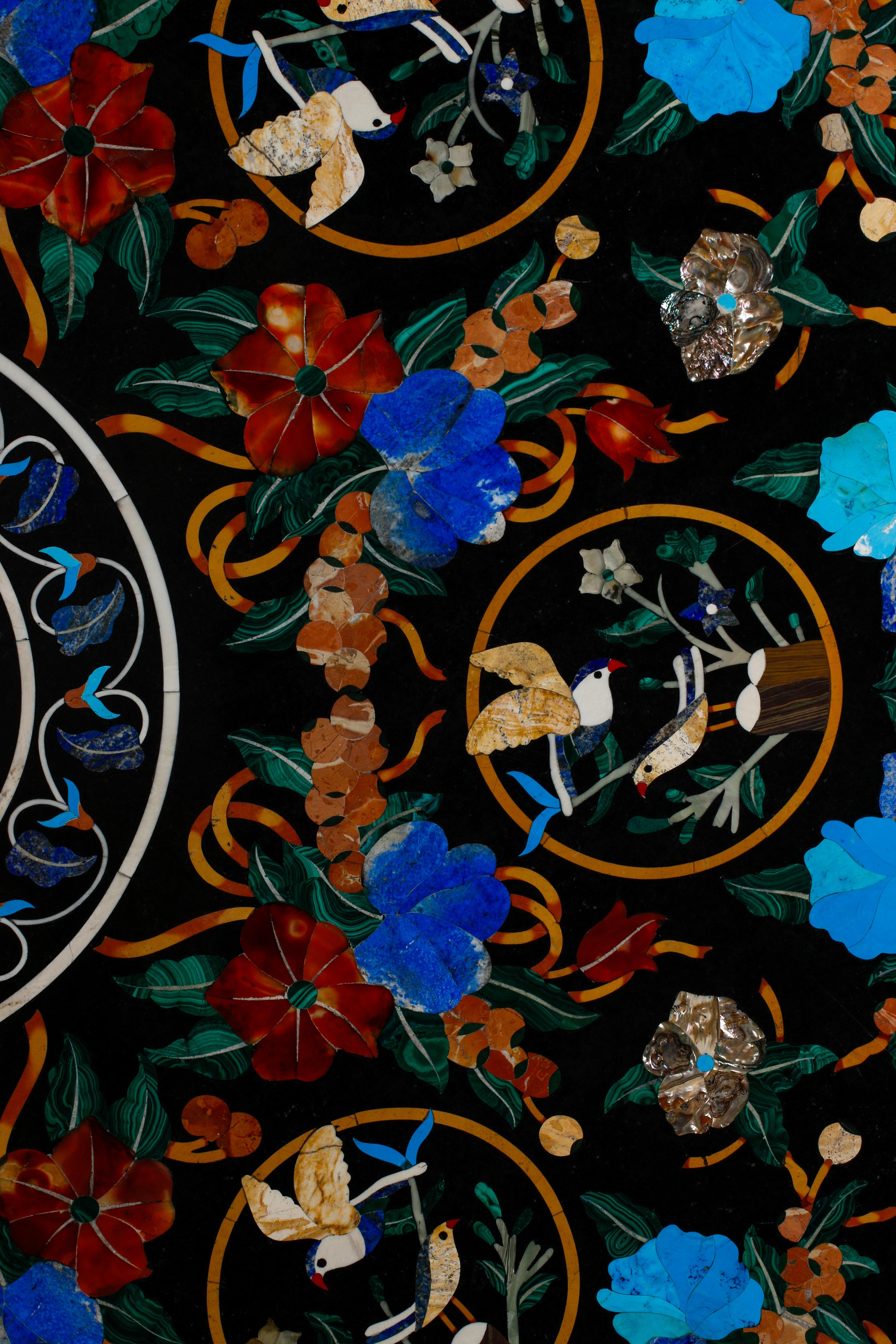 A Large Italian Pietra Dura Table Top on a Bronze Base