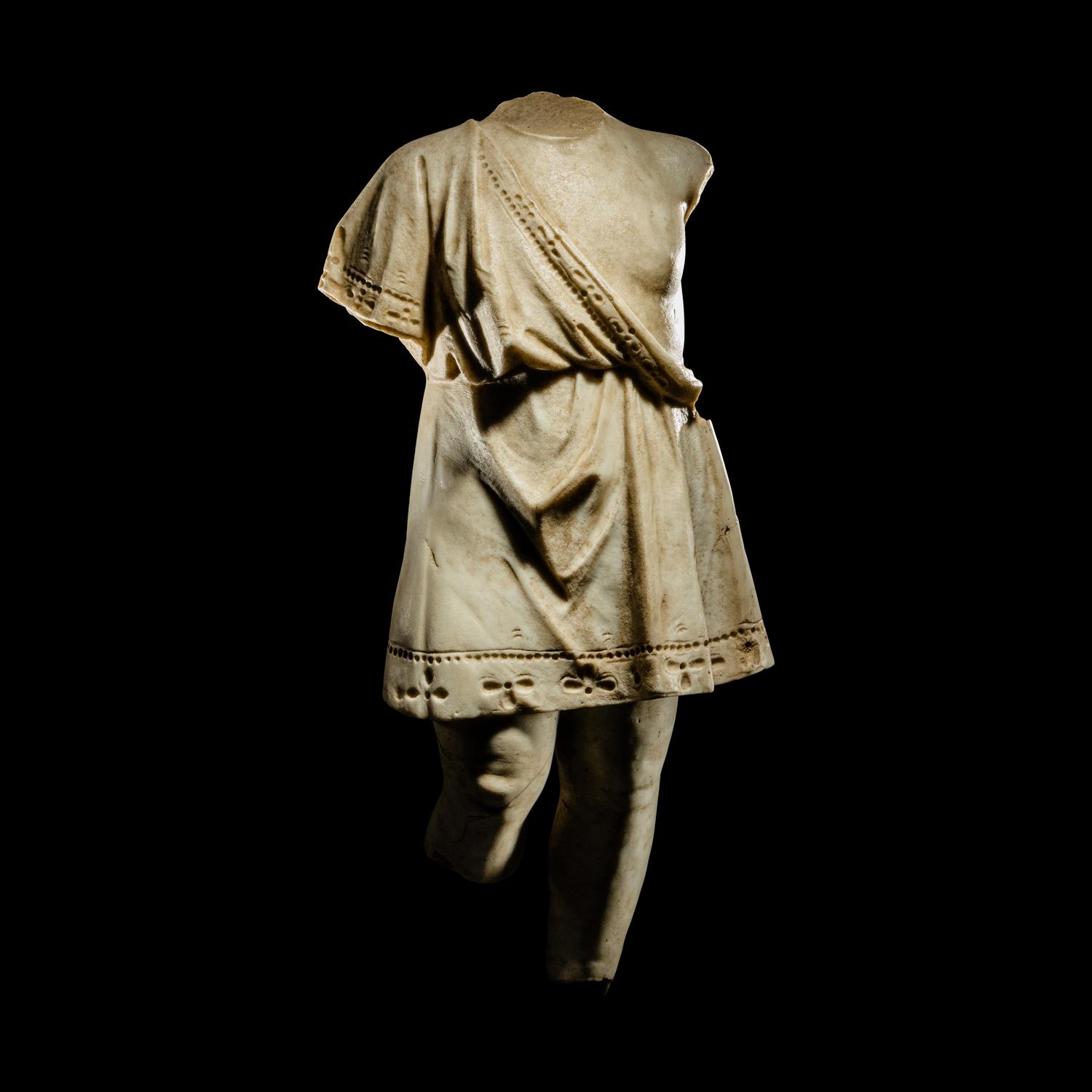 A Roman Style Marble Torso of a Child