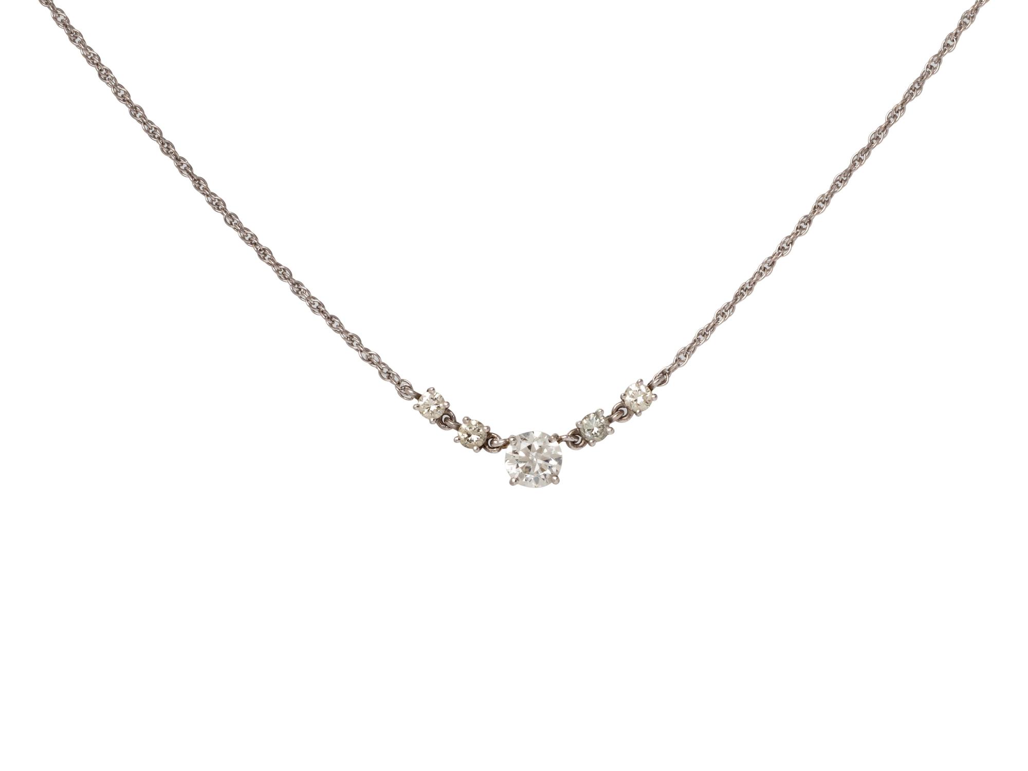 A 14 Karat White Gold and Diamond Necklace,