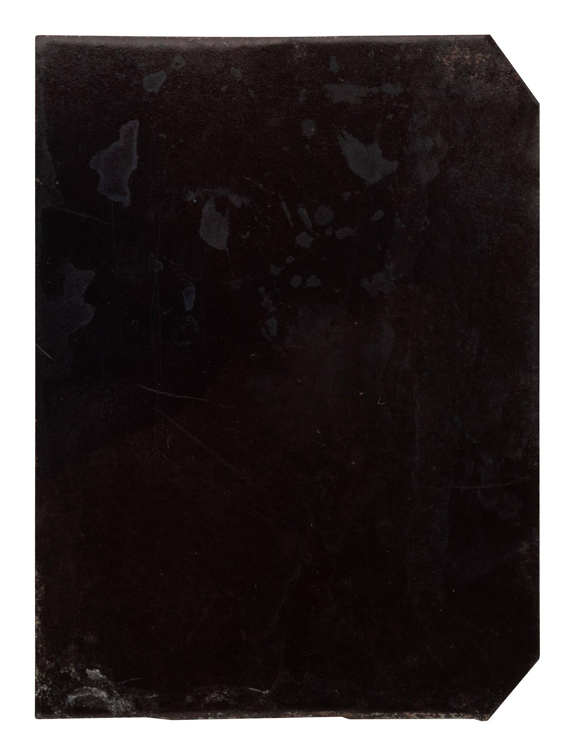 [EARLY PHOTOGRAPHY]. Tintype of an African American couple in an outdoor setting.