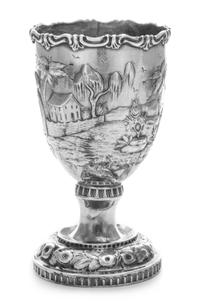 An American Silver Chalice, Canfield Bros. & Co., Baltimore, MD, 1849, the body worked to depict a tropical garden scene and an engrave