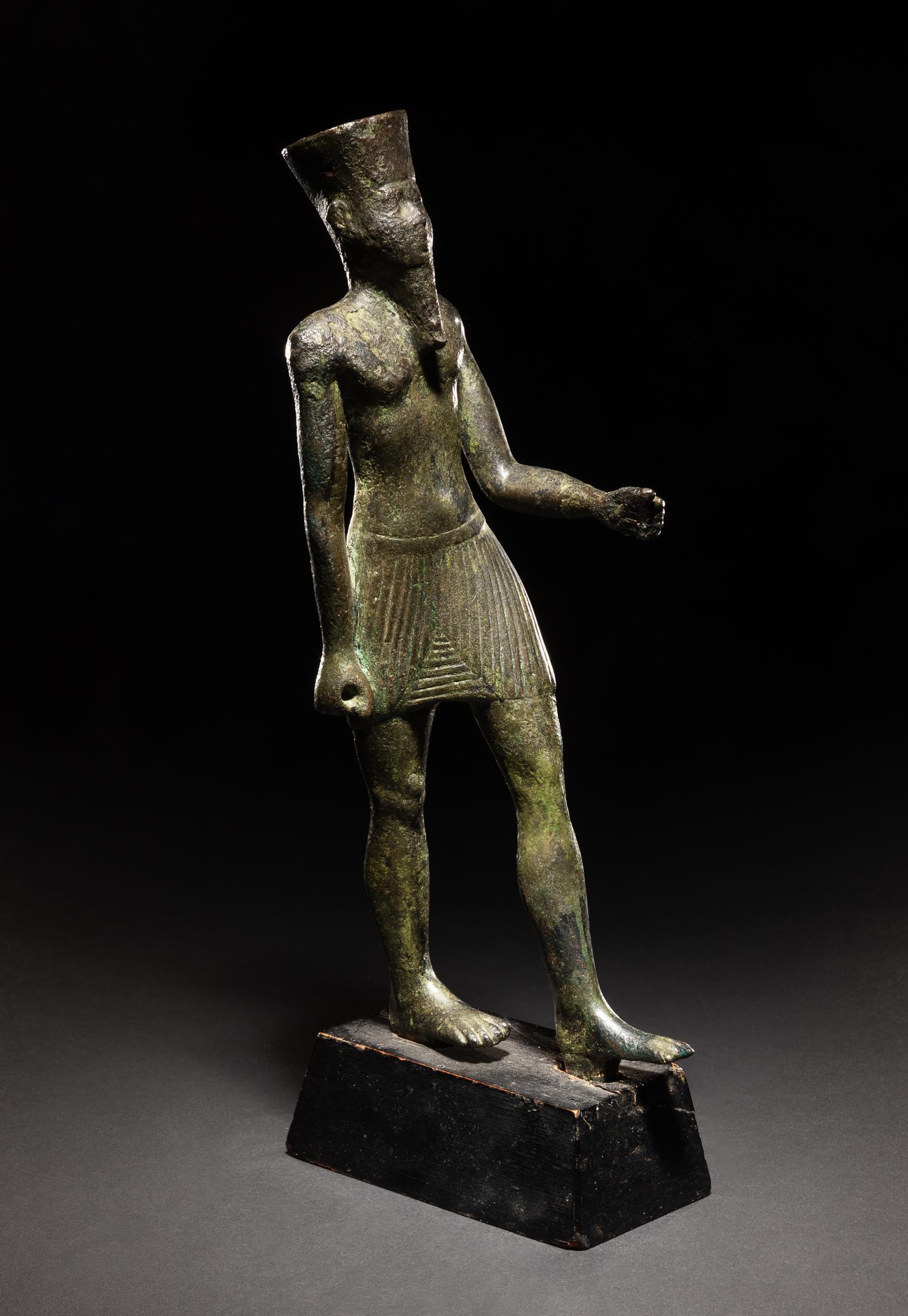 An Egyptian Bronze Figure of Amun