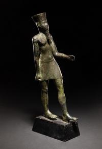 An Egyptian Bronze Figure of Amun