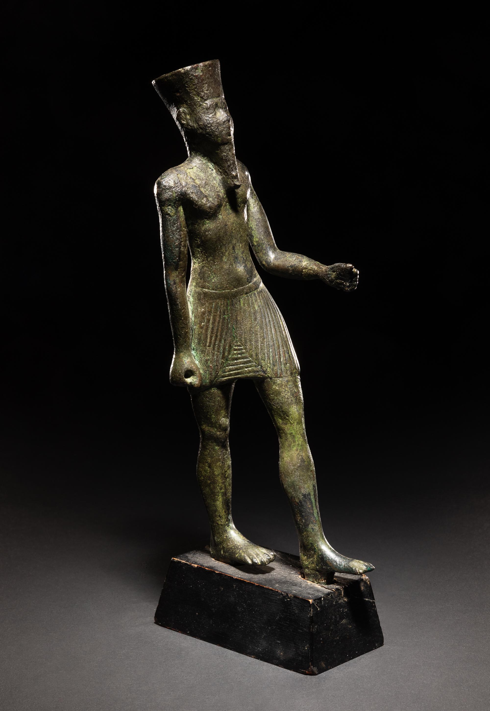 An Egyptian Bronze Figure of Amun