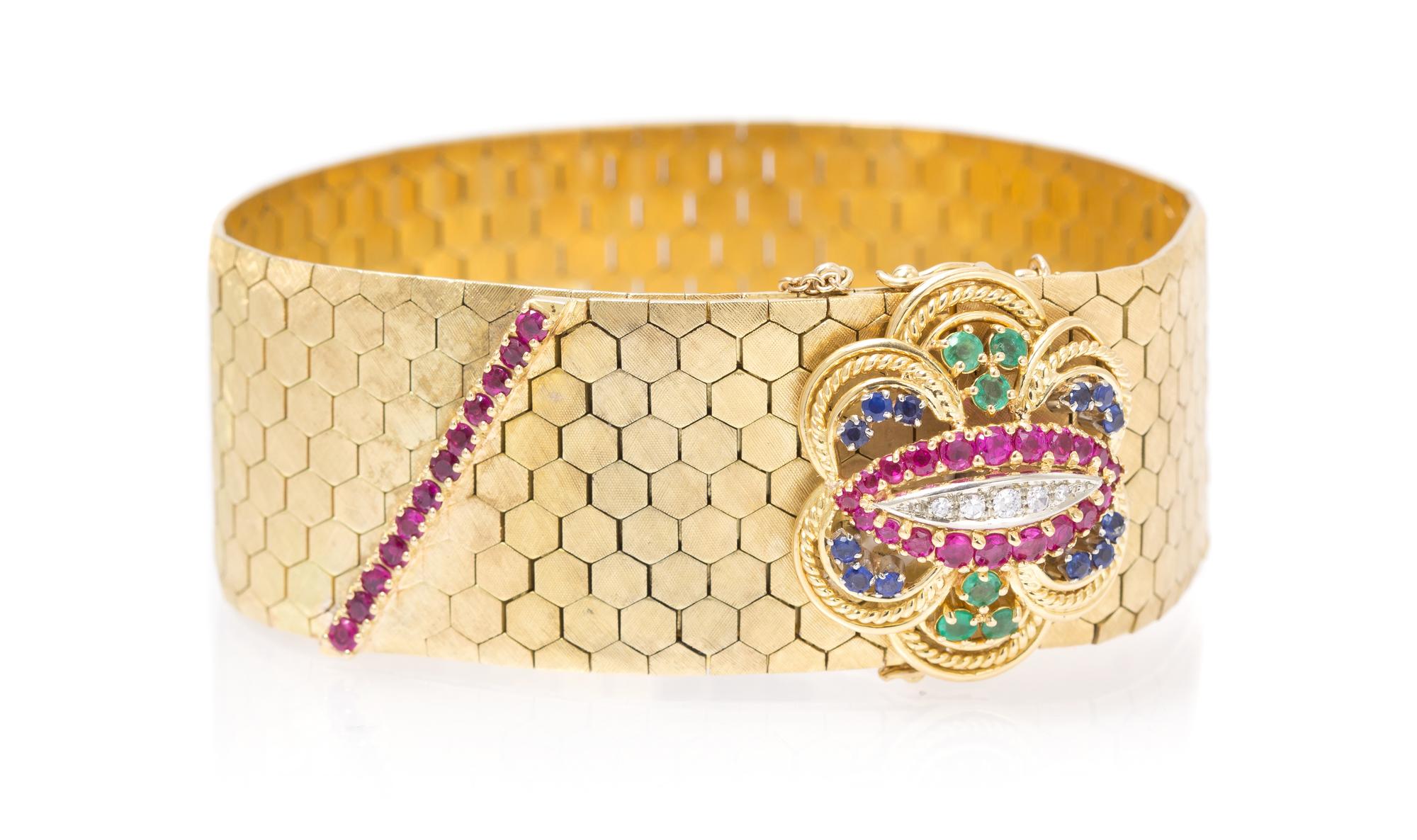 A Vintage 18 Karat Yellow Gold Diamond, Ruby, Emerald and Sapphire Bracelet, 50.80 dwts.