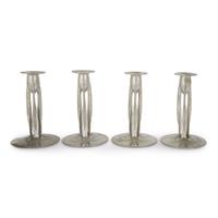 Archibald Knox for Liberty & Co. assembled set of four pewter "tudric" candlesticks, england,circa 1905