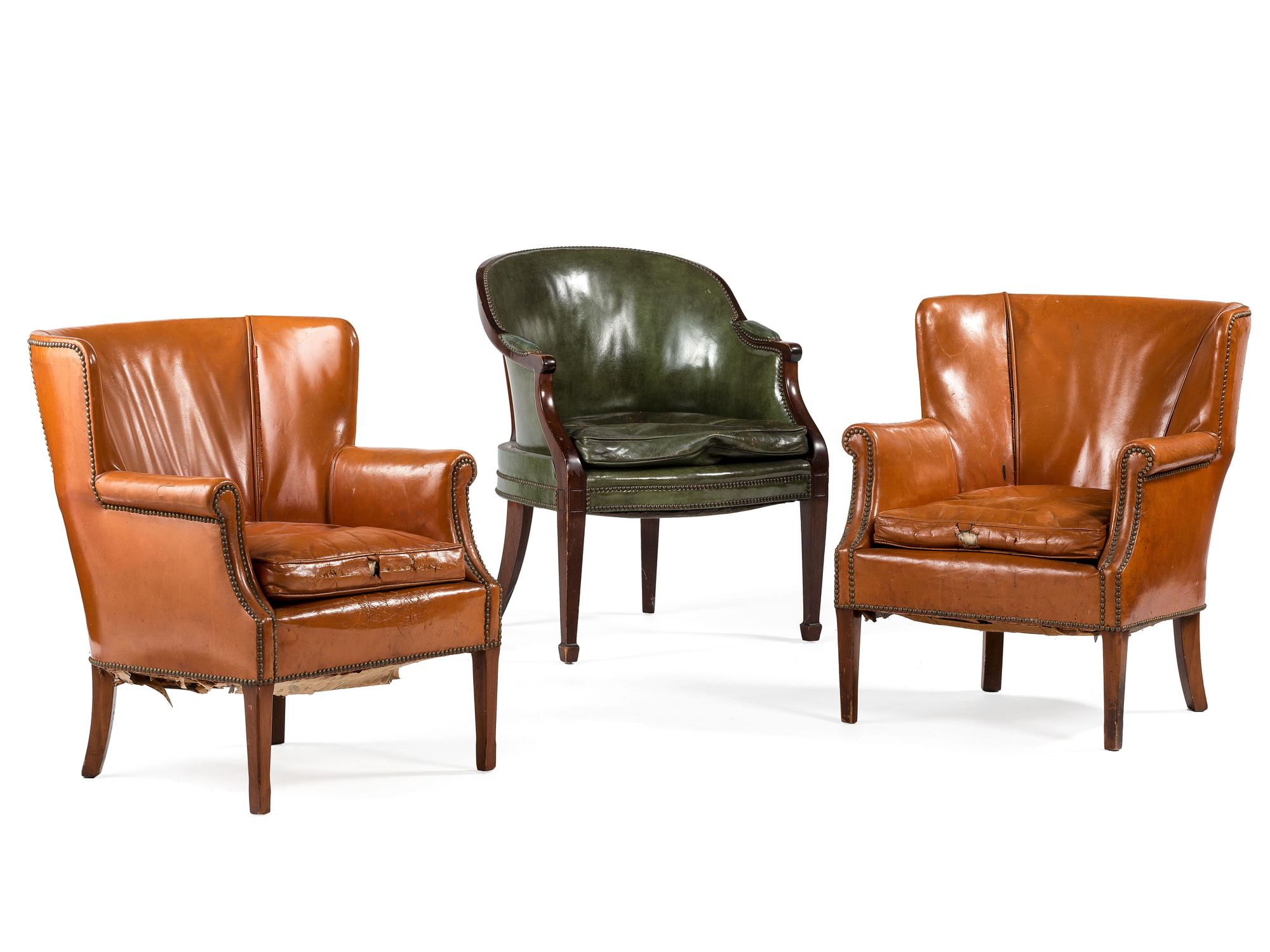 Three Leather Upholstered Armchairs