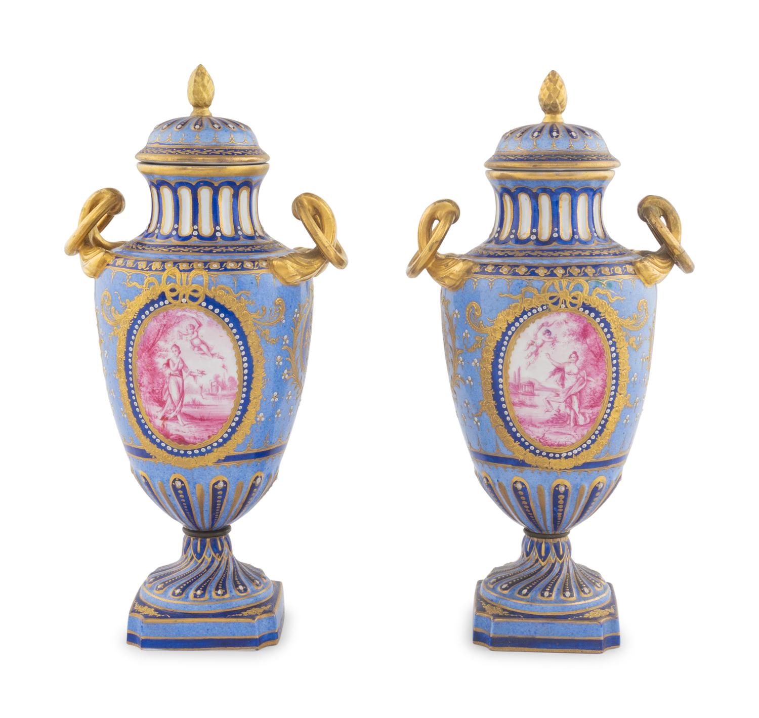 A Pair of Sèvres Porcelain Covered Urns