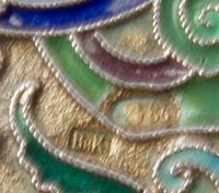 A Russian Enameled Silver Cigarette Case, Maker's mark Cyrillic ViK, Moscow, the case decorated with geometric and abstracted foliate e