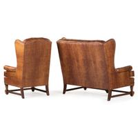A Set of Leather Upholstered Button Tufted Wingback Sofas and Armchair