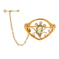 ART NOUVEAU, YELLOW GOLD, PERIDOT AND SEED PEARL BROOCH