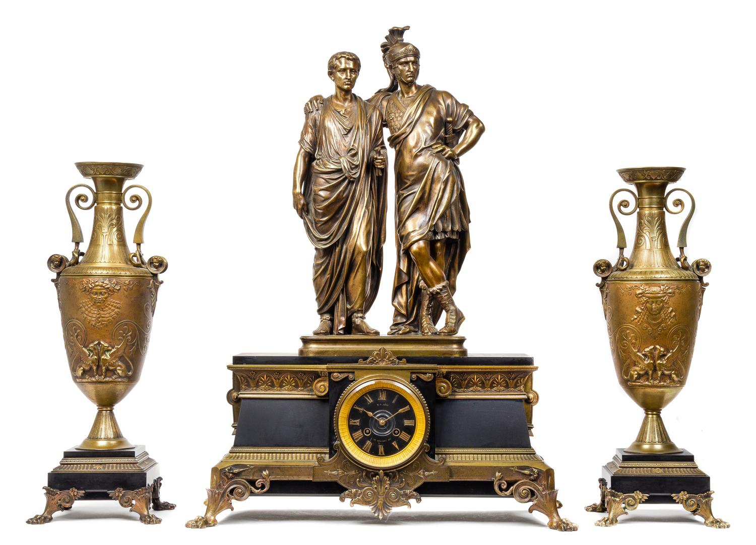 A French Gilt Bronze and Slate Clock Garniture Height of mantel clock 30 1/4 x width 22 1/4 inches. — DIAL SIGNED G.J. LEVY, PARIS, CIRCA 1870