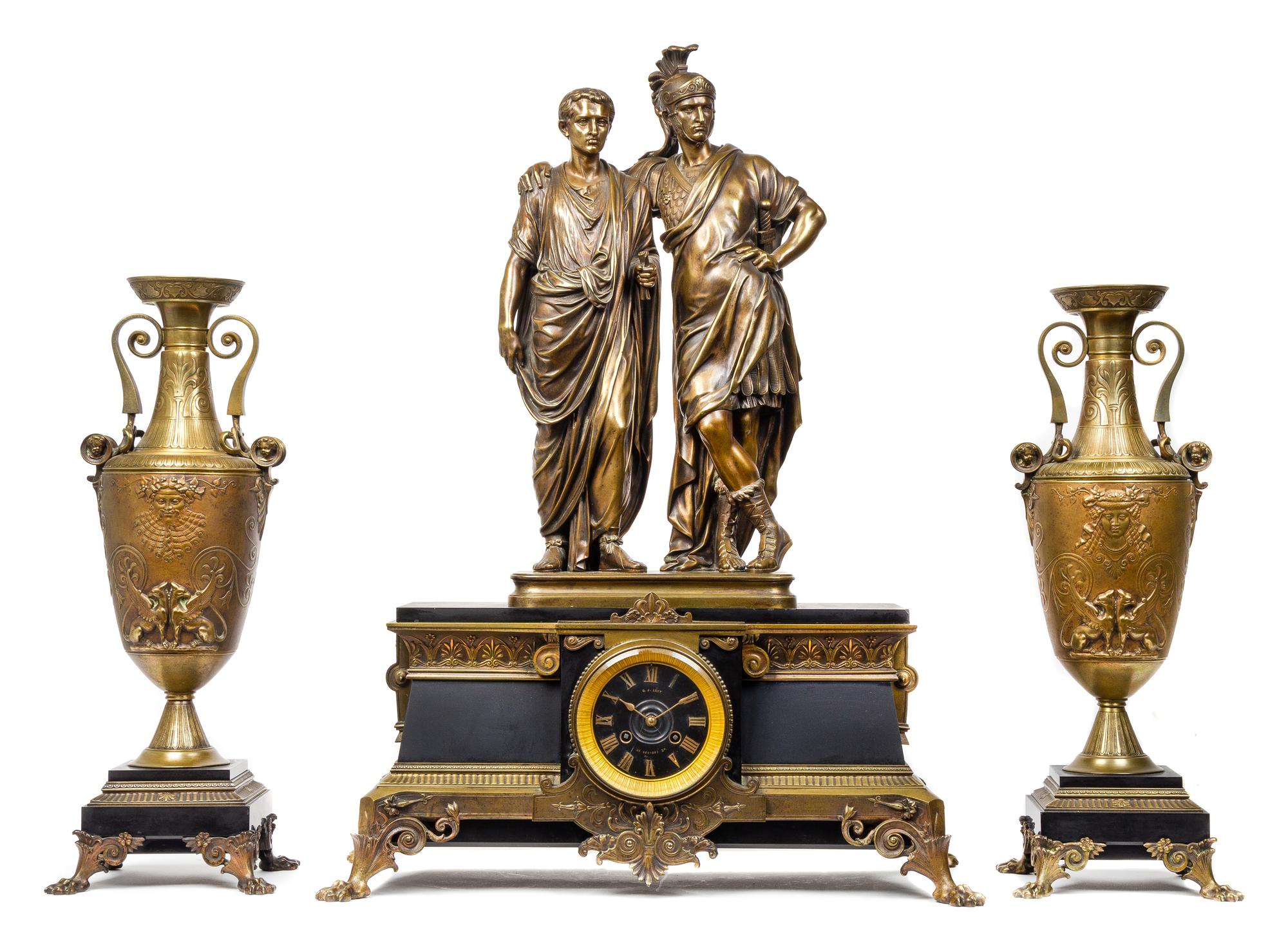 A French Gilt Bronze and Slate Clock Garniture Height of mantel clock 30 1/4 x width 22 1/4 inches. — DIAL SIGNED G.J. LEVY, PARIS, CIRCA 1870