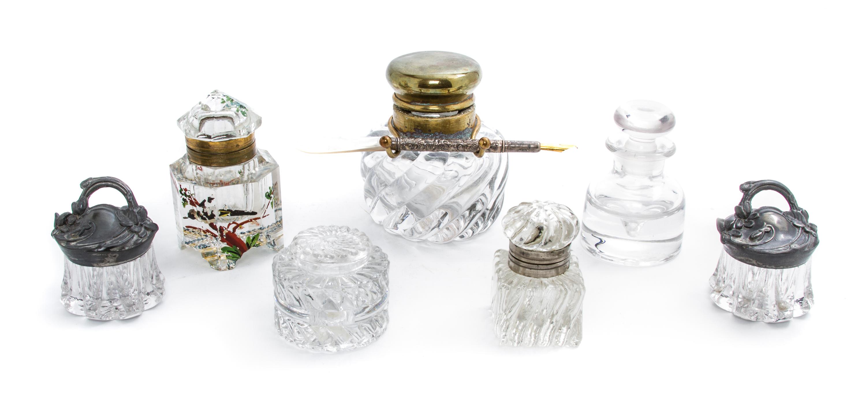 A Collection of Six Pressed Glass Inkwells, Height of tallest 3 1/4 inches.